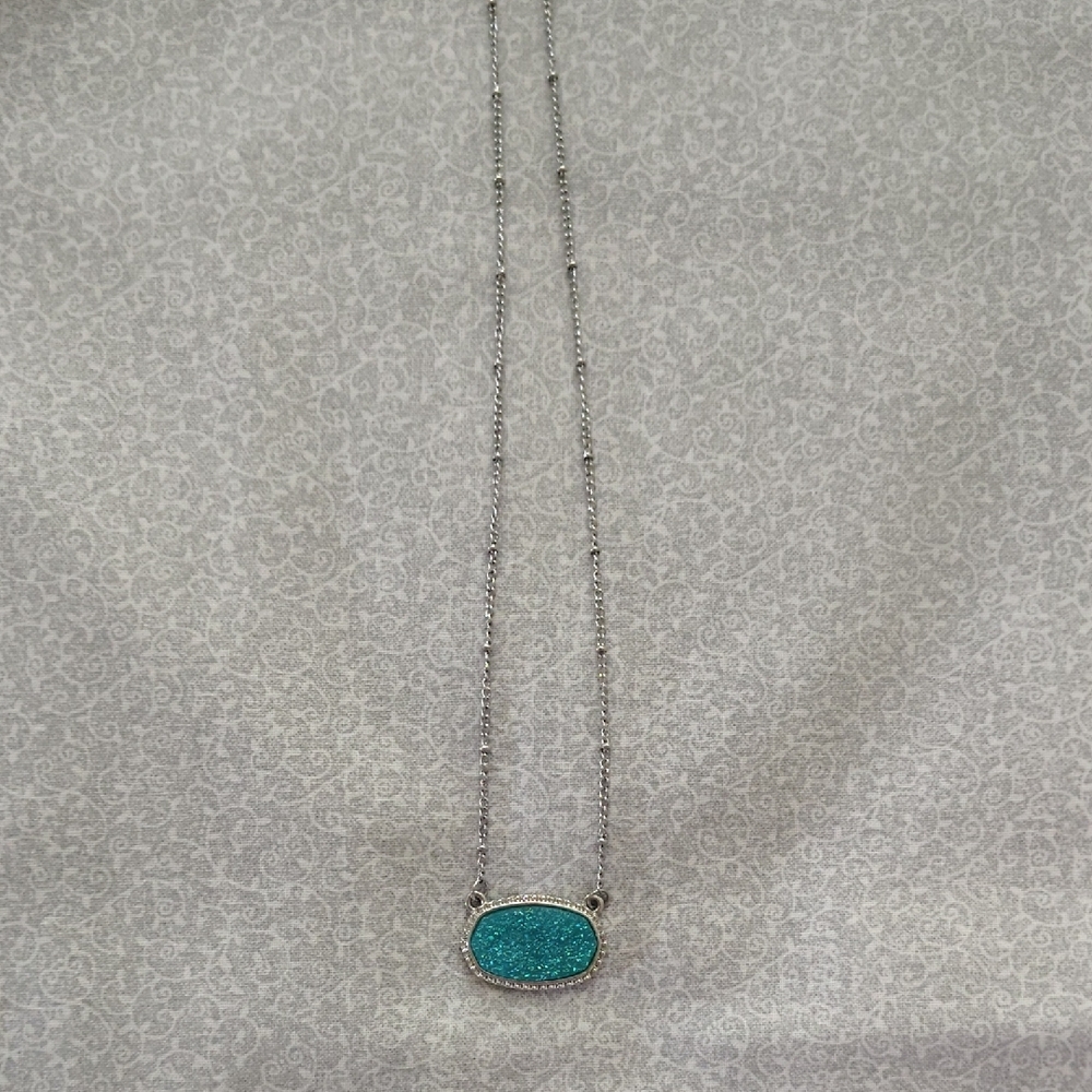 Elegant Silver and Turquoise Pendant Necklace